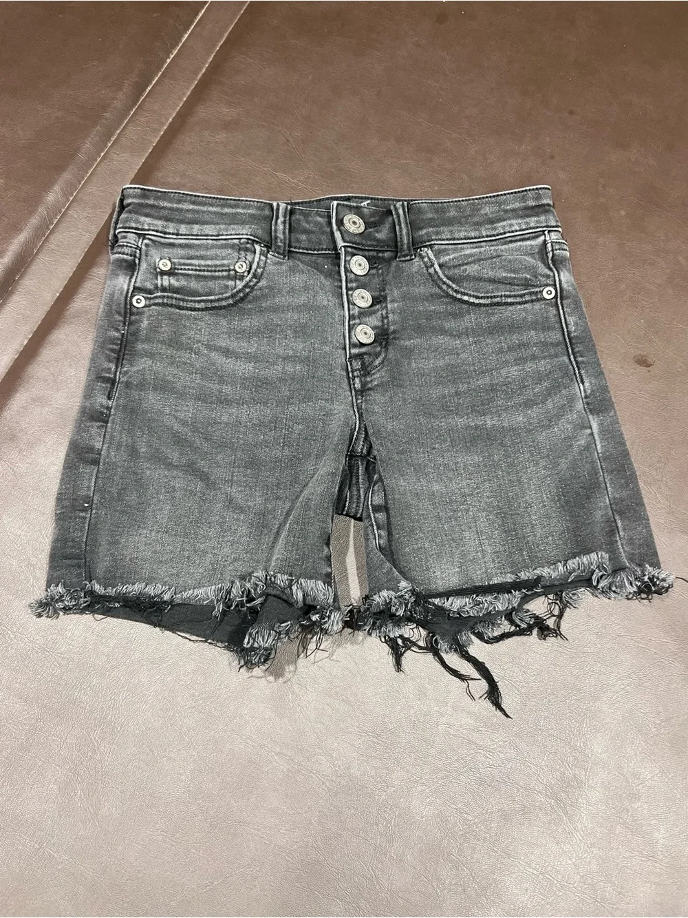 American Eagle Outfitters black denim shorts with button detail